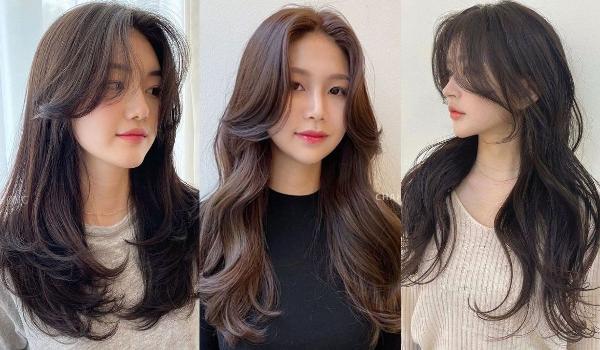 Bàn tay đang thực hiện kỹ thuật buộc cao tóc layer mái bay ở góc độ gần